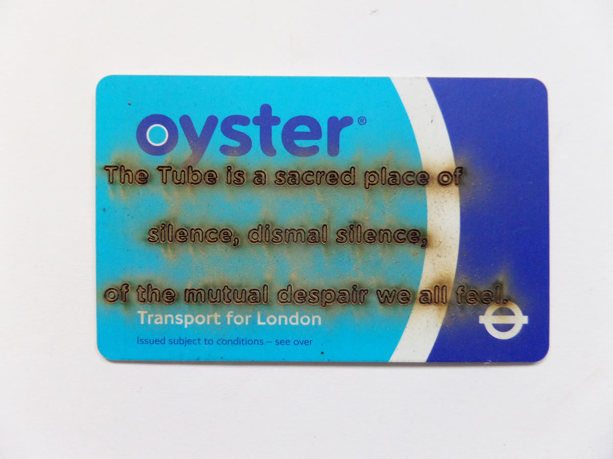 'Sacred' - Laser engraved text from the internet on Oyster card, 2016